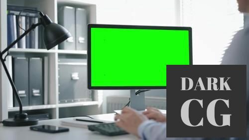 MotionArray Office Computer With Green Screen 1036890